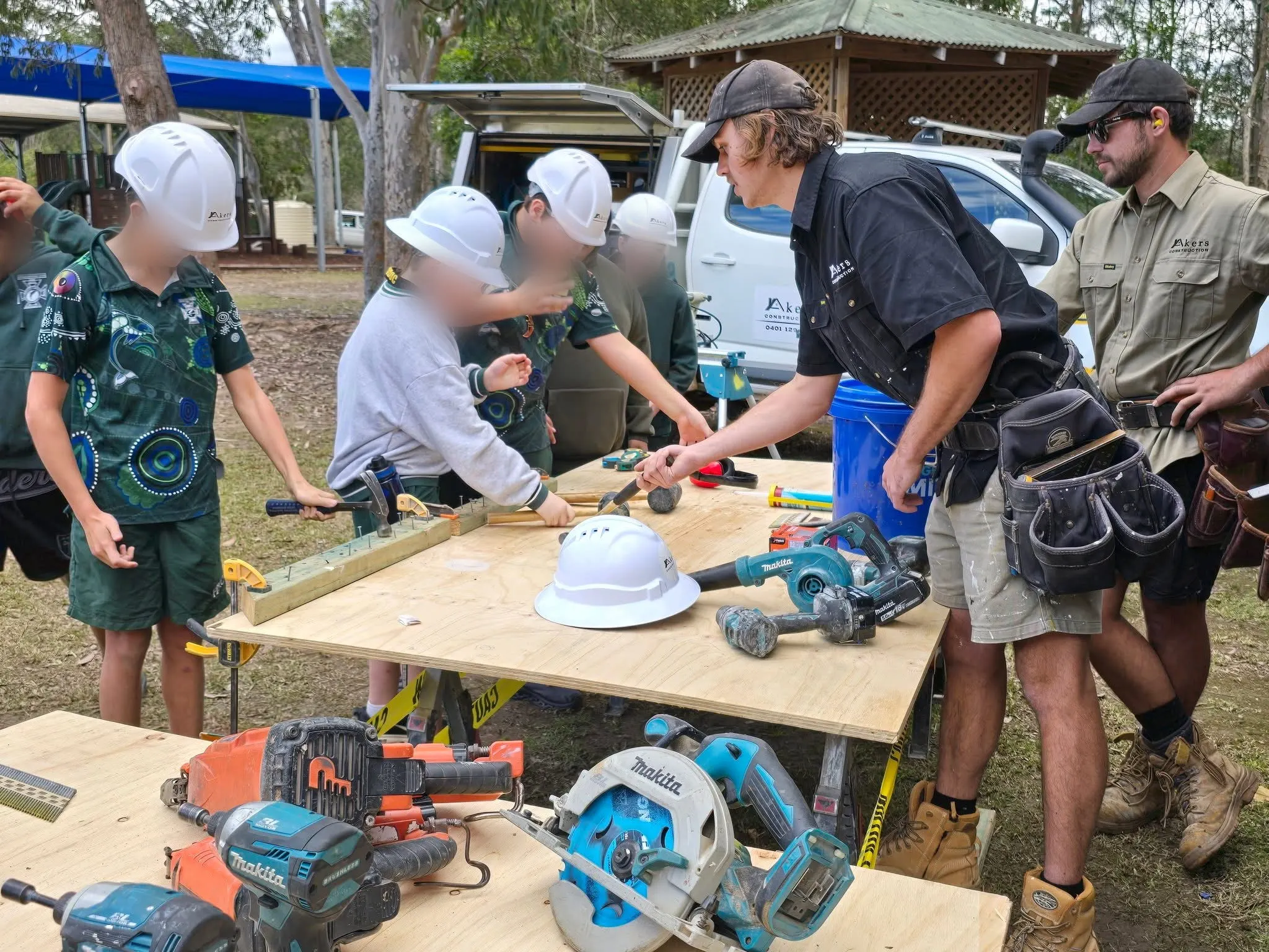Akers Construction carpenters running a hands-on tools workshop with local school students on the Coffs Coast