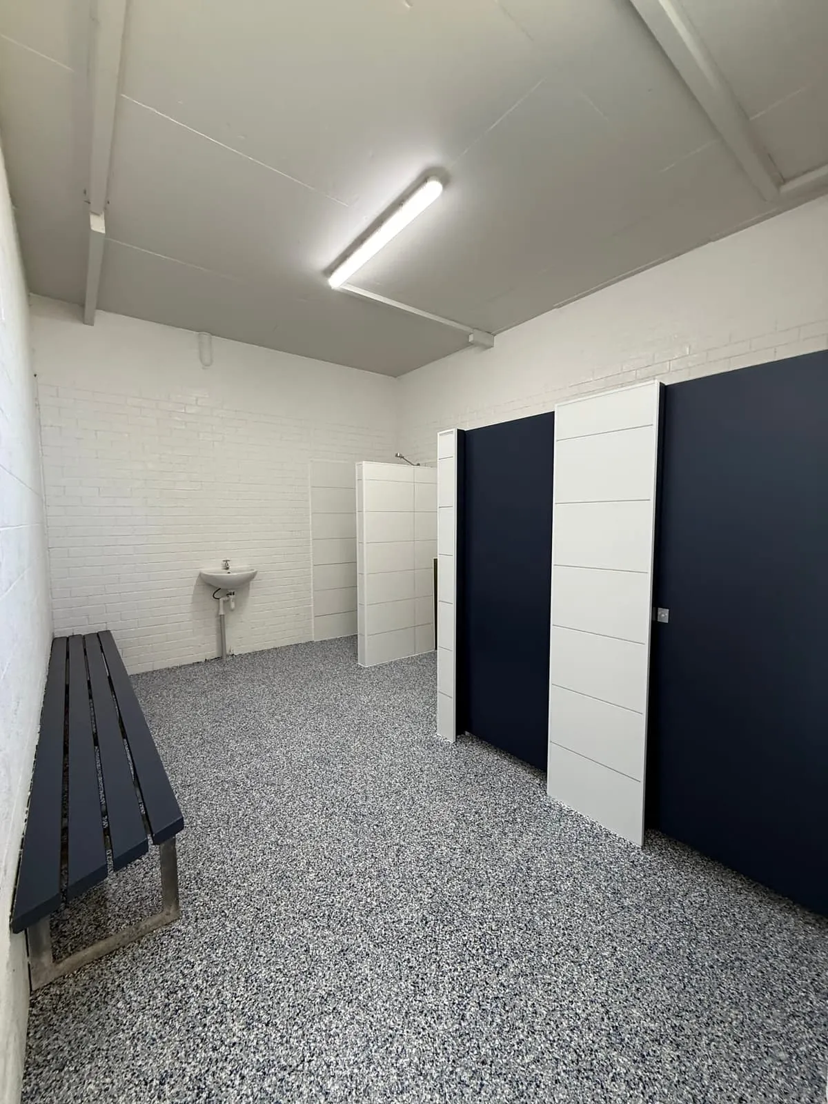 Refurbished changeroom at the Nambucca Heads Main Beach amenities with new cubicles and flooring