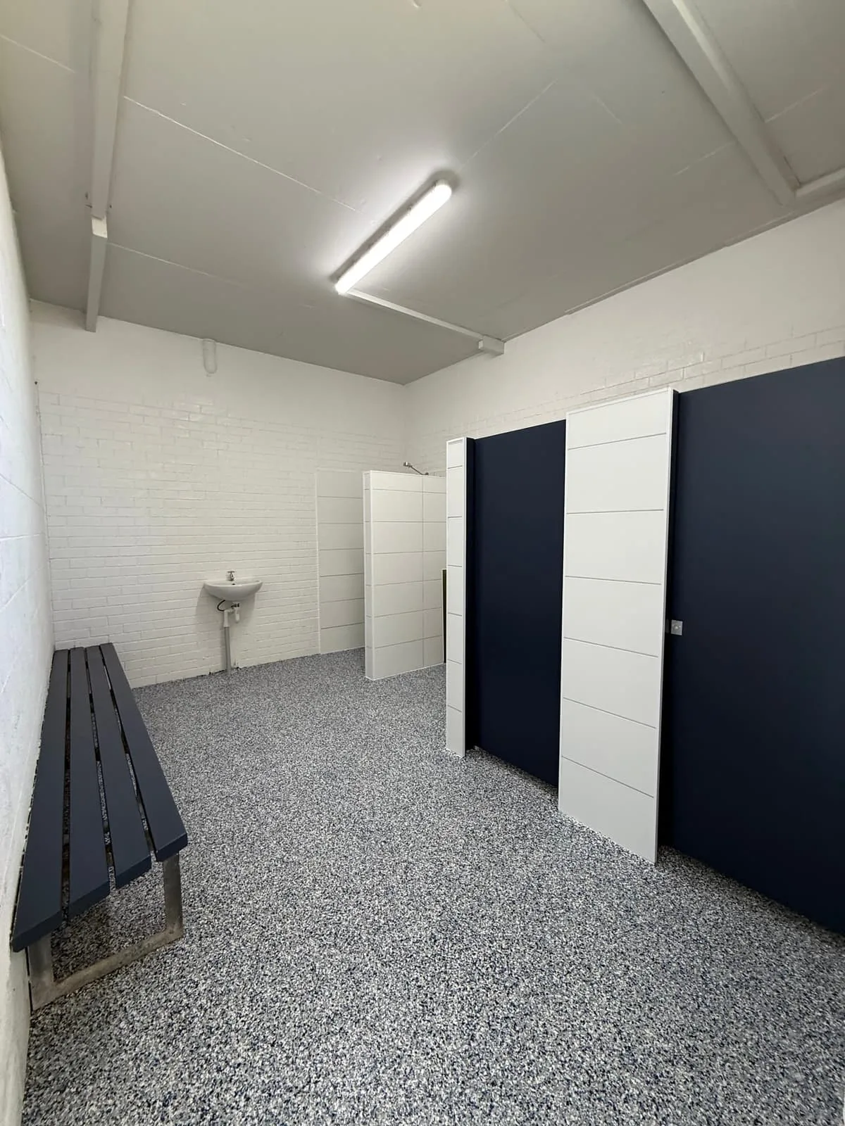 Refurbished changeroom at the Nambucca Heads Main Beach amenities with new cubicles and flooring