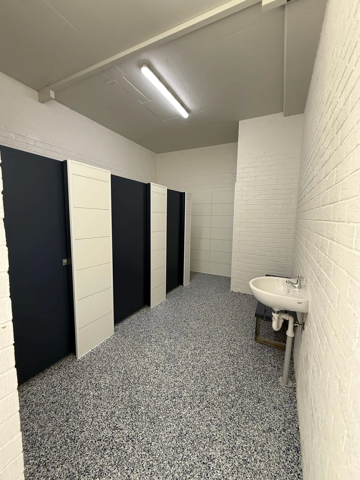 New navy and white toilet cubicle doors at the Nambucca Heads Main Beach amenities