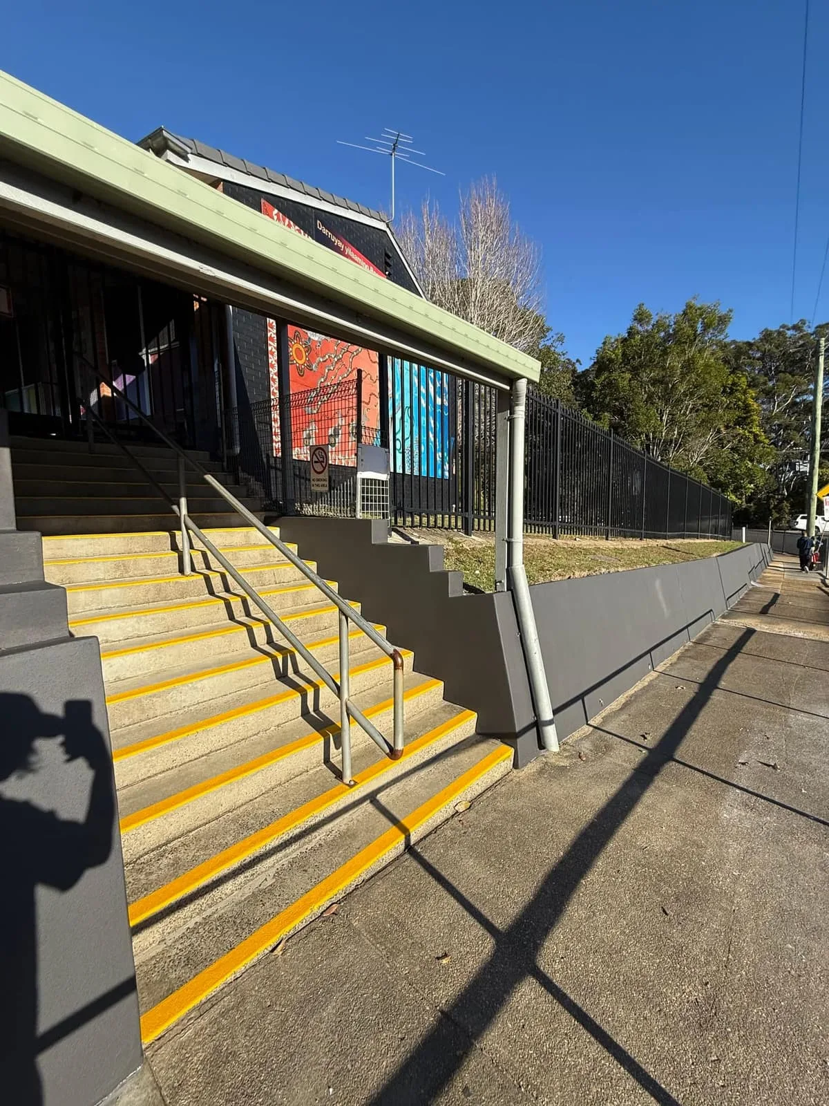School entrance stairs with new handrail and yellow safety nosings, Nambucca Heads