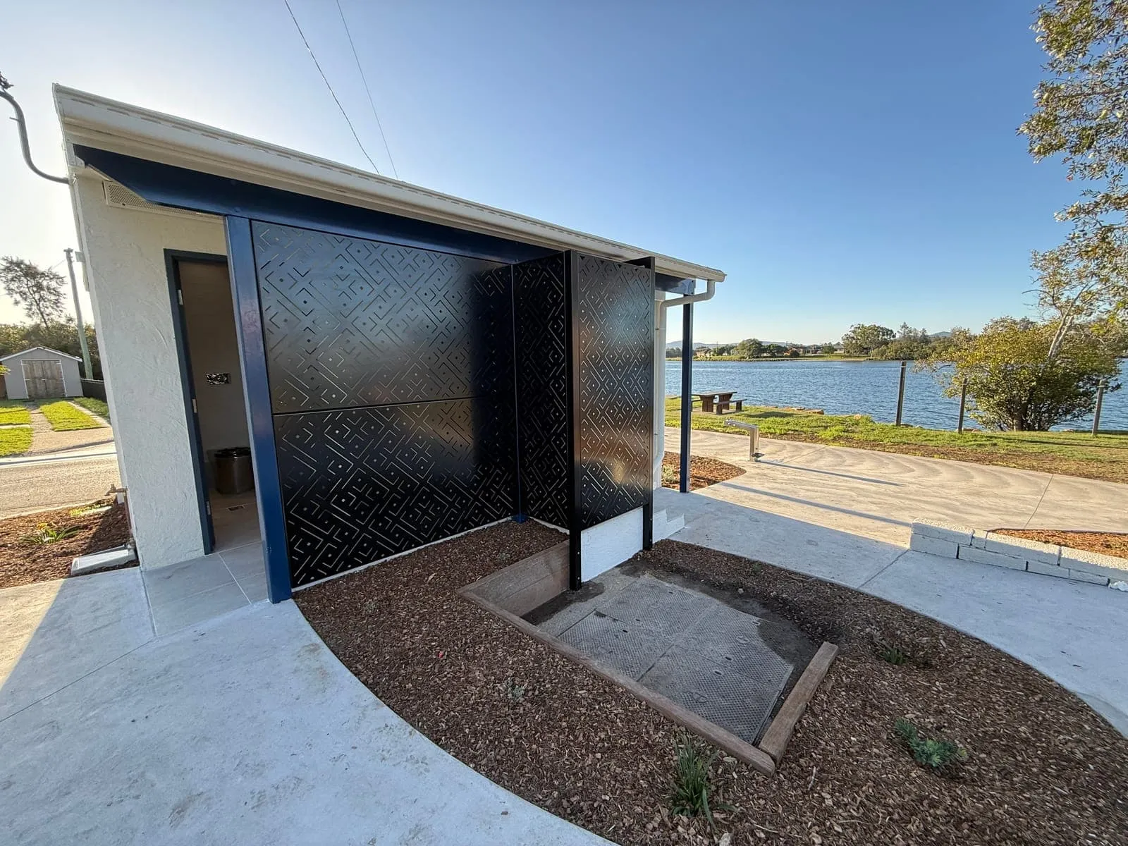 Patterned steel screen wall and covered entry at the River Street amenities, Macksville