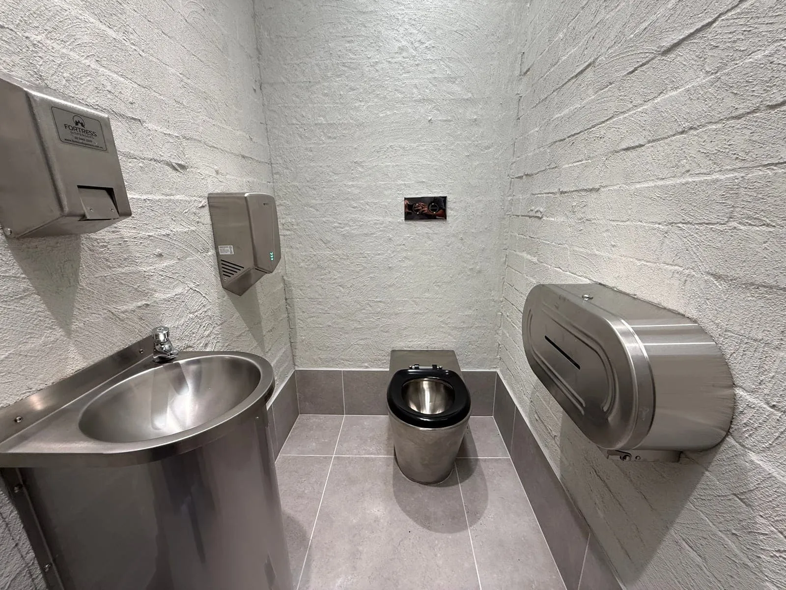 Vandal-resistant stainless steel basin, pan and dispensers inside the River Street amenities, Macksville