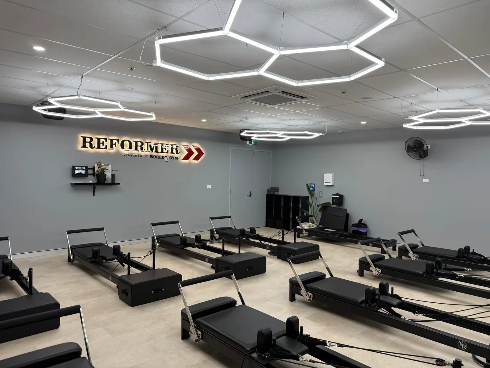 Completed reformer studio fit-out at World Gym Coffs Harbour, ready for classes
